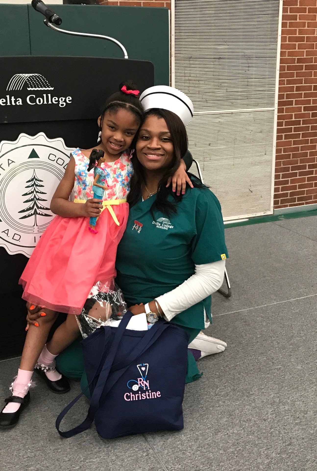 A proud moment — nursing graduation with my little one by my side